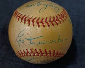 Another view of the 1954 Autographed New York Giants baseball signed by Leo Durocher, Herman Franks, Dave Koslo, Dusty Rhodes, Wally Bock, Wes Westrum, Bob (Bobby) Hofman, Geo (George) Wilson, Fred Fitzsimmons, Monte Irvin, Ruben Gomez, Rog (Roger) Bowman, Al Corwin, Sal Maglie, “The Barber”, Bill Rigney, Whitey Lockman, Daryl Spencer, Willie Mays, and Hoyt Wilhelm. Also has a stamped “Howard Green, Pres.” signature. That was a Class B minor league in Texas, and Green was president from ‘51-‘55. 