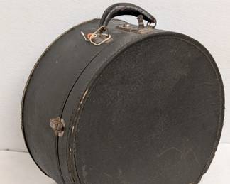 Vintage black round train case or hat box, possibly 1940s