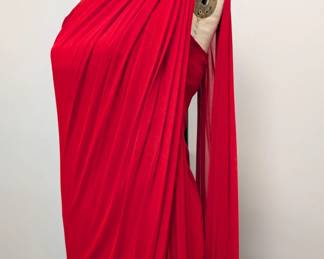 Another view of the 1970s vintage Halston one shoulder red jersey Grecian toga style maxi gown