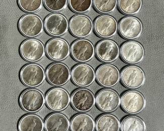 Reverse of the Thirty eight (38) Silver Peace Dollars of mixed dates, sold as silver bullion