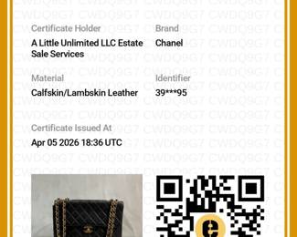 Certificate of Authenticity by Entrupy for the vintage Chanel Classic Flap Bag, black quilted lambskin leather with gold-tone hardware—an interlocking CC turnlock clasp—and a chain strap laced with leather. 