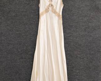 A 1940s vintage nightgown with lace accents, silk or a silk rayon mix
