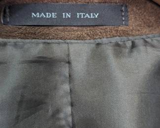 Closeup of men's brown suede leather blazer jacket, made in Italy