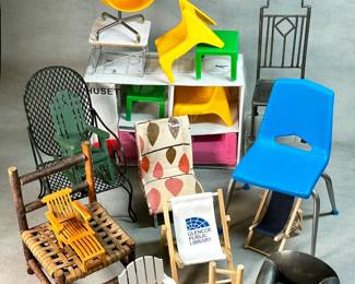 A collection of vintage miniature furniture featuring various styles, including mid-century modern, rustic, and patio seating.