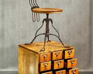 An antique Max Tonk "twisted wire" drafting architect office revolving chair, by the Tonk Mfg Co of Chicago, iron and wood, with adjustable seat; and antique early 20th century 12-drawer oak Remington Rand library cabinet on original casters 