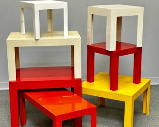 Mid century modern multi-color plastic tables in white, red, and yellow; 
