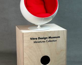 A 1:6 scale replica of Eero Aarnio's iconic 1963 Ball Chair design, produced for the Vitra Design Museum's Miniatures Collection