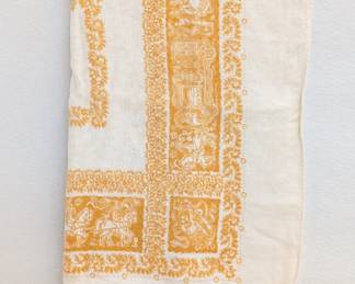 A vintage linen tablecloth with damask pattern of a Tyrolean folk art wedding procession with people and horse-drawn carriage, bordered by floral and decorative motifs