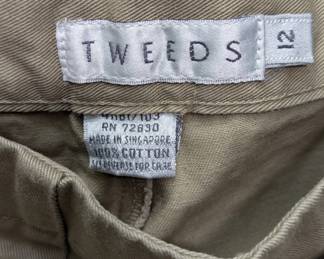 Closeup of Tweeds women's beige, high-waisted cotton wide-leg trousers with double row of buttons on the side, size 12