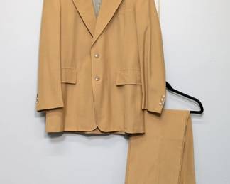 A vintage 1970s camel brown men's suit, a blazer jacket and matching trousers