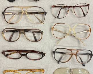 Collection of vintage sunglasses and eyeglass frames, some from Italy and France