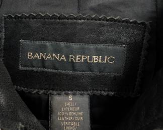 Closeup of the Banana Republic woman’s black lambskin leather jacket size S, biker motocross style zip front vintage leather jacket