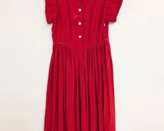 A red silk dress with black pinstripes, button front and short sleeves