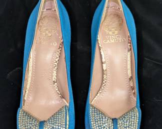 Another view of the pair of vintage Vince Camuto blue satin rhinestone heels and bows open toe shoes, size 7