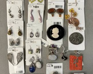 Sterling silver earrings and pendants, amber earrings, copper brooch, cameo brooch, and more 