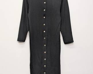 A women's black long-sleeve maxi shirt dress featuring a full button-front design