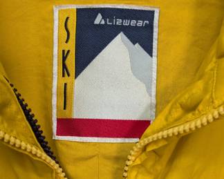 Closeup of the vintage Lizwear brand yellow ski coat