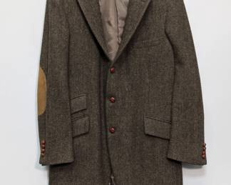 A vintage Polo Ralph Lauren tweed herringbone blazer with elbow patches