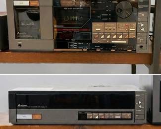 A vintage Mitsubishi DA-L70 AM/FM stereo cassette auto changer system featuring a 7-cassette magazine capacity, and a Mitsubishi LT-70 linear tracking fully automatic turntable