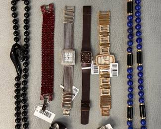 Fashion wristwatches including a Cenere silver-finish square dial bezel adorned with rhinestones and a multi-strand snake chain bracelet, a Peter Bornie luxury women's quartz wristwatch featuring a rose gold-tone rectangular case and band adorned with rhinestones; a lapis lazuli beaded necklace, a modernist silver ring set with black cabochon stone, a wine-colored rhinestone bracelet, and more
