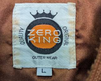Closeup of tobacco-color suede leather bomber jacket by Zero Kings, size L