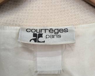 Closeup of vintage Courrèges Paris cream wool double-breasted style tapered coat