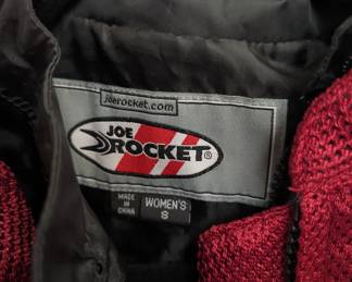 Closeup of Joe Rocket women's Cleo Elite jacket, red, size S, a stylish and versatile mesh jacket with a waterproof liner and an insulated vest
