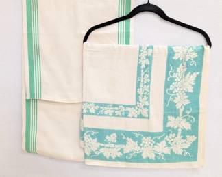 Vintage linen table runner with green stripe border, and a vintage linen table cloth with fruiting grape vines border