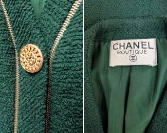Closeup of Chanel Boutique green jacket in signature bouclé wool with golden zippers and buttons