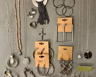 Sterling silver earrings, bracelet, pendant necklaces (including hoop earrings and pendant necklace set); silver-tone modernist cabochon brooch with pendant metal tassles
