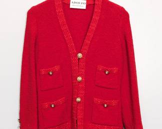 An Adolfo bright red button-embellished knit cardigan or jacket featuring four front pockets