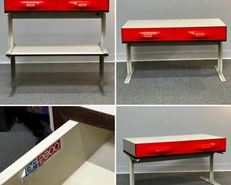 A Raymond Loewy DF2000 two-drawer console table or stereo/tv table, from the “DF2000” collection designed by legendary industrial designer Raymond Loewy and produced by Doubinsky Freres, 1968; the drawer fronts moulded from vivid red Metacrylene set in a frame of off-white plastic and rosewood veneer supported by moulded lacquered white aluminum. (Shown here with another spare stand or set of spare legs that was attached to a piece of matching laminate to create a coffee table)