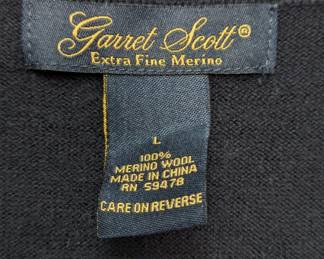 Closeup of Garett Scott men's black merino wool polo neck pullover sweater, size L  