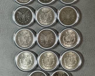 Reverse of the Fourteen (14) Morgan Silver Dollars of mixed dates