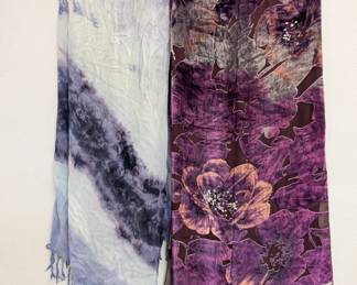 Scarfs available include this pastel white and purple dyed and fringed scarf, and a beautiful purple and peach floral pattern sheer scarf