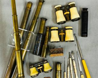 A selection of vintage items, primarily maritime and optical instruments including brass telescopes or "spy glasses", binoculars and opera glasses; some vintage combs, a button hook and other small travel tools