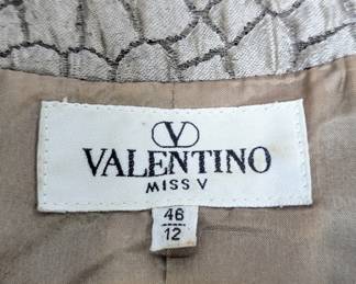 Closeup of vintage Valentino quilted croc texture cropped jacket, size 46/12