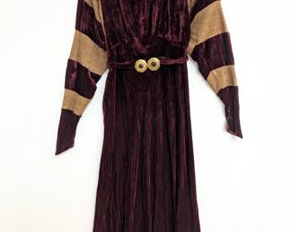 A vintage long-sleeved wine-colored velvet and gold knit striped dress, belted at waist with gold tone buckle  