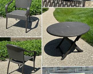 A set of eight Frontgate Café All Weather curved back outdoor wicker chairs with one matching table