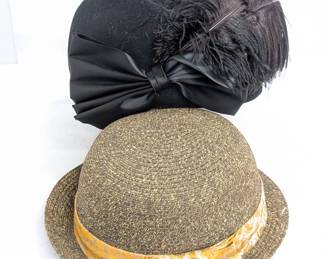 A Goorin Brothers woven straw hat and a vintage women's black felt hat with fabric bow and black feathers
