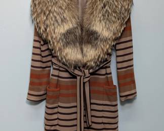 A vintage Bill Blass brown, cream, and orange striped Penny Lane style coat with plush, exaggerated fur collar and two front pockets. Perfect to pull together your '70s boho chic look!
