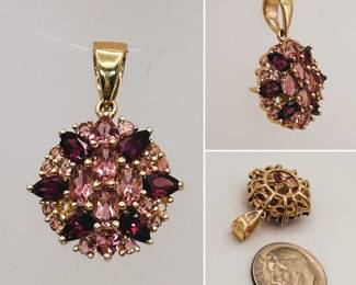 14k yellow gold flower-form pendant set with pink tourmaline and garnet gemstones, as-shown (2 pink stones missing)
