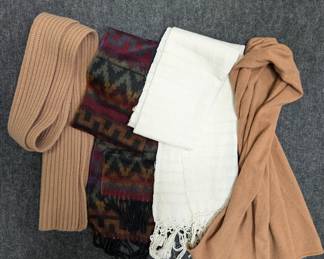 More scarves including white cotton with fringed ends, knitted alpaca and woven cashmere wool designs 