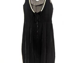 Back view of black velvet cutout cocktail party sheath dress, sleeveless, rhinestone trim at neckline