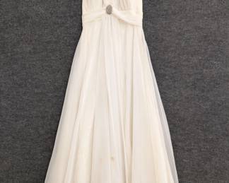 A fabulous 1970s vintage Mike Benet Formals white chiffon halter dress with rhinestone clip