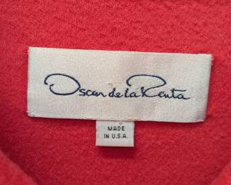 Closeup of Oscar De La Renta womens red cashmere swing coat