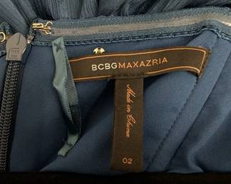 Closeup of the stunning BCBGMaxazria blue pleated strapless maxi dress size 02