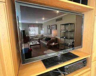 Samsung flat-screen TV, Sony 5 disc DVD player, and Denon audio receiver