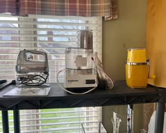 Cuisinart Classic food processor, Cuisinart 7-speed hand mixer, and vintage yellow ice cream maker