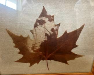 Exquisite and rare carved Chinar leaf folk art featuring an intricate silhouette of a fisherman